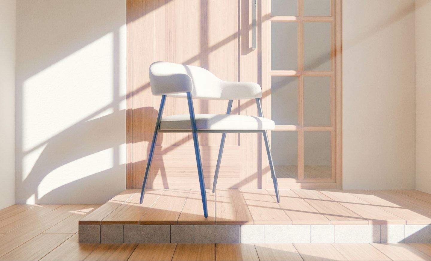 A white chair with arms in a sunlit room, the window’s light across the floor.
